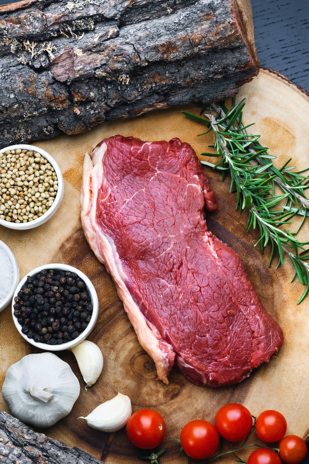 Raw steak prepping for cooking