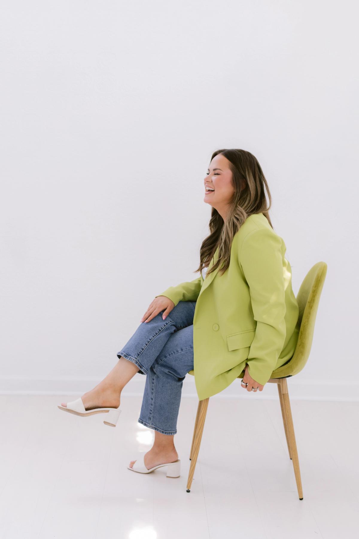 Candace sitting on a chair