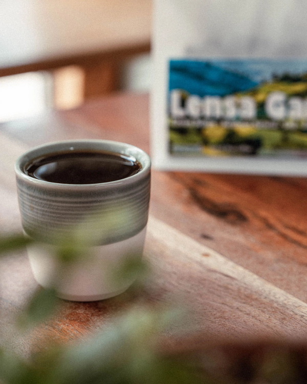 a cup of coffee on a table