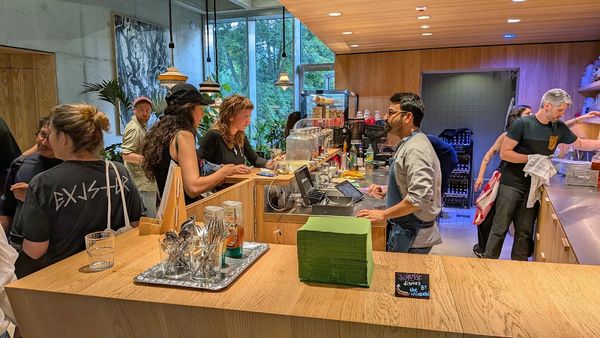 Customers being served Warawul Coffee at Café Rummana