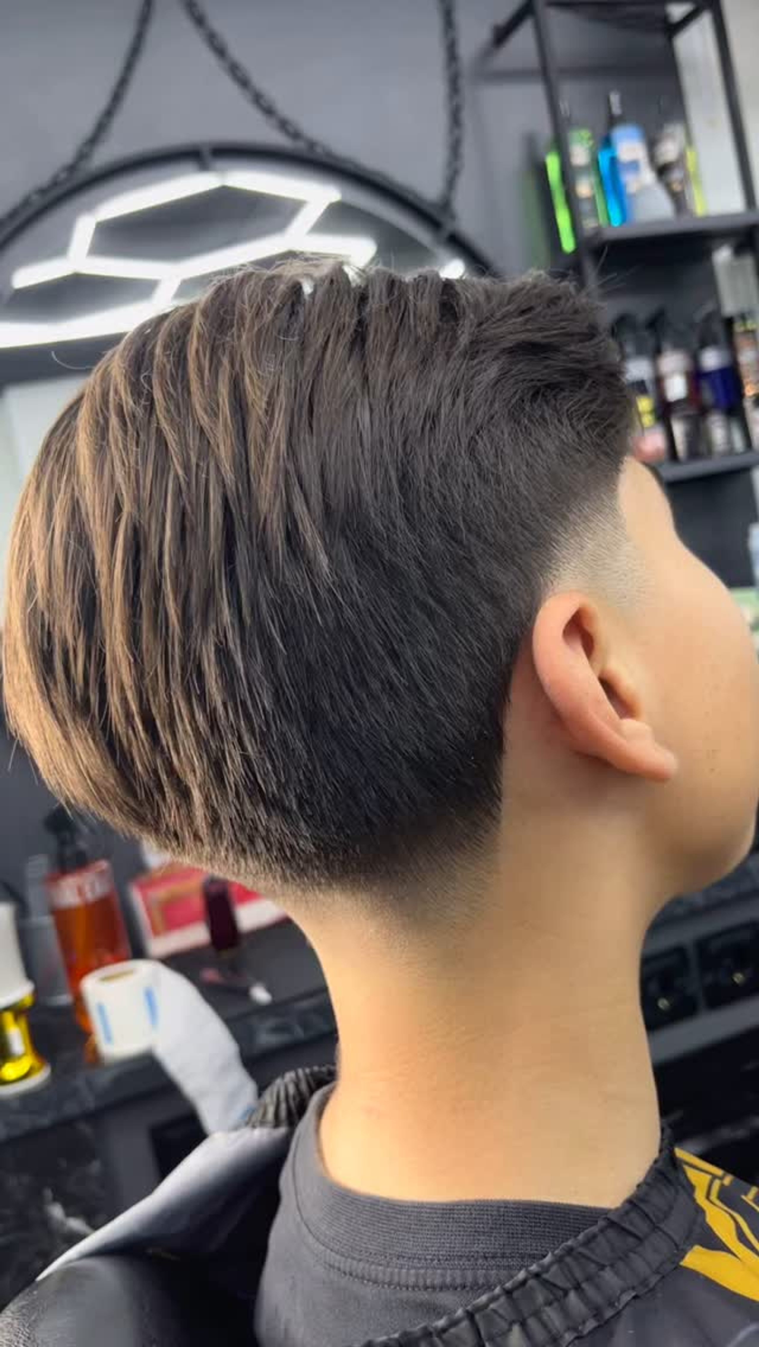Pelo texturizado por arriba con desvanecido en el lateral