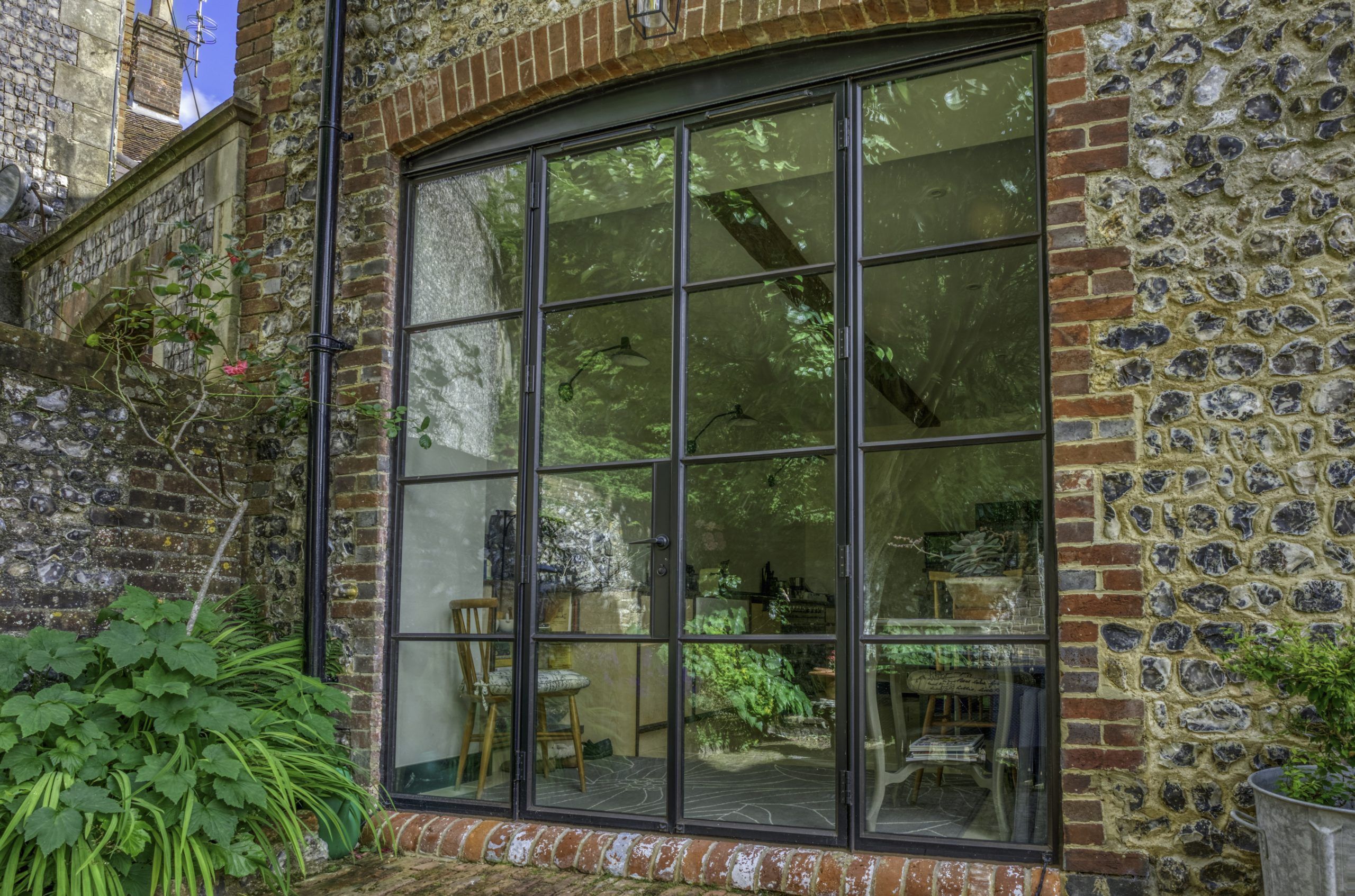 Bespoke glazing with slim steel windows on a residential extension