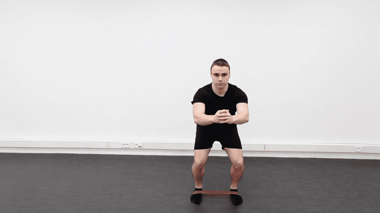 Side Steps With Resistance Band Around Your Feet, view 1