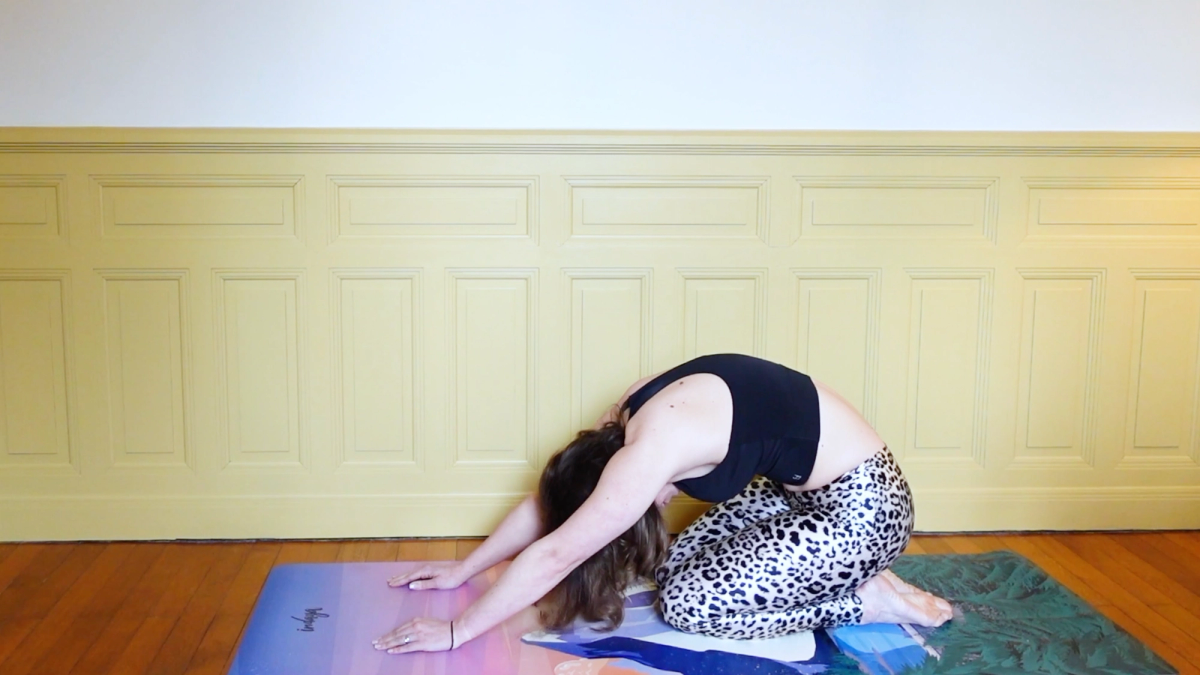 Child’s Pose With Lift Through the Coccyx