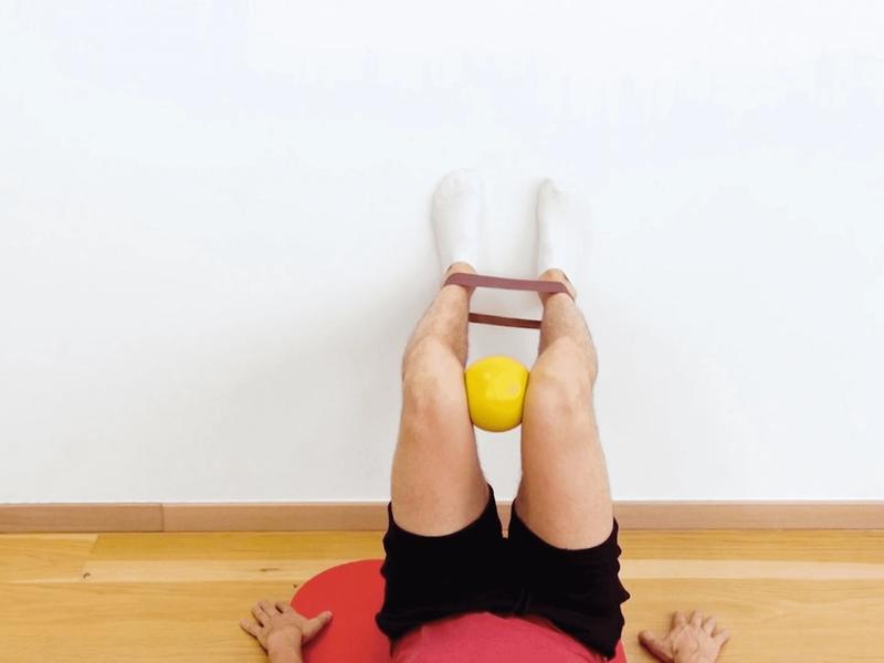 Supine Hip Internal Rotation Strengthening With Elastic Band, view 1