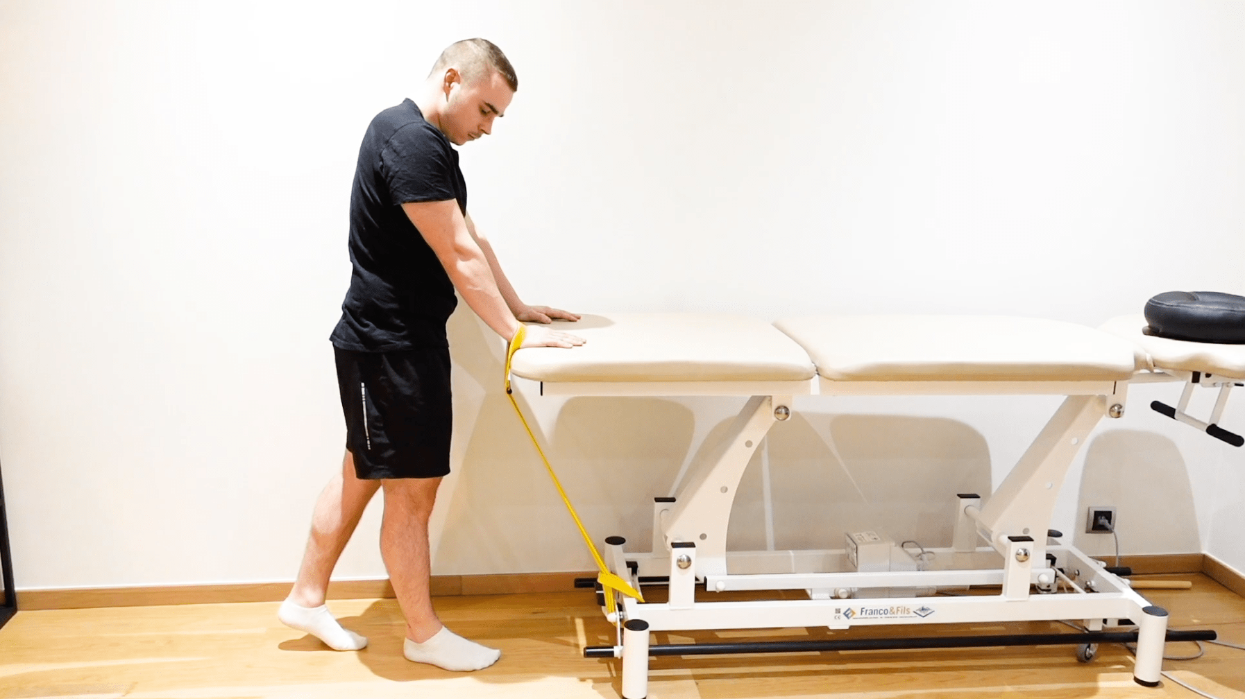 Wrist Extension Mobilization With Elastic Band Traction, view 1