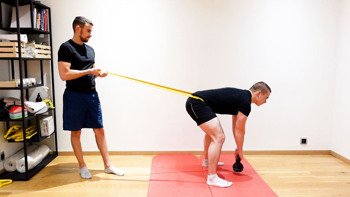 Deadlift With Rear Traction