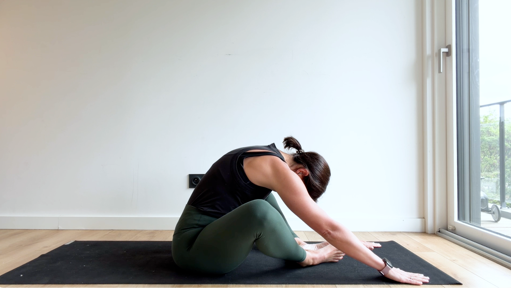Posture du papillon (« Baddha Konasana »)