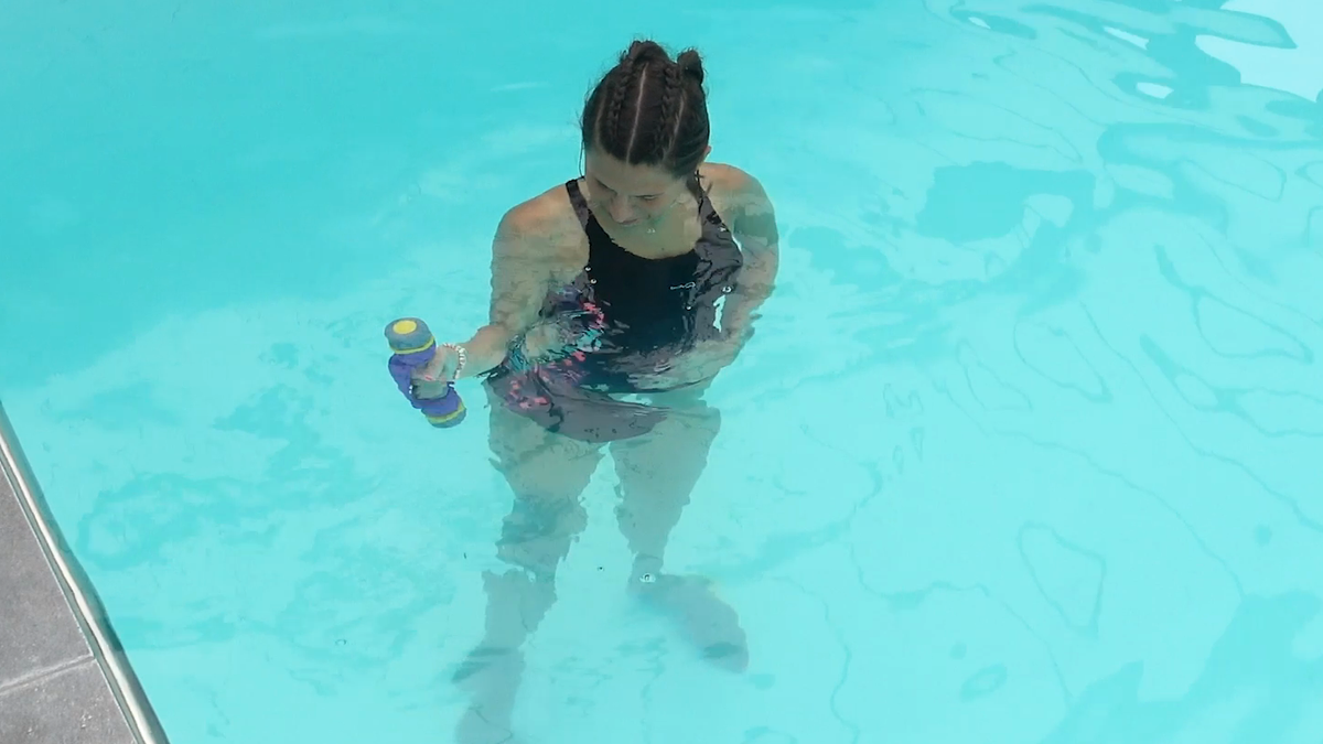 Shoulder Rotations With the Elbow at the Side and a Water Weight