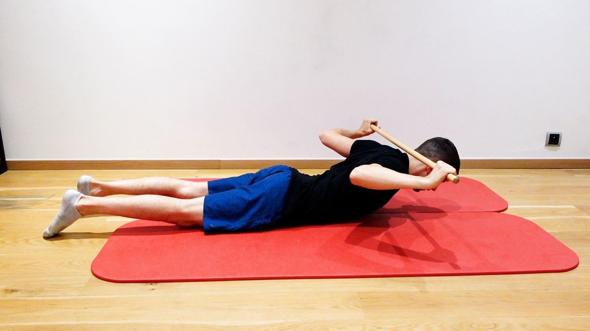 Lower Back Extension Strengthening With Stick
