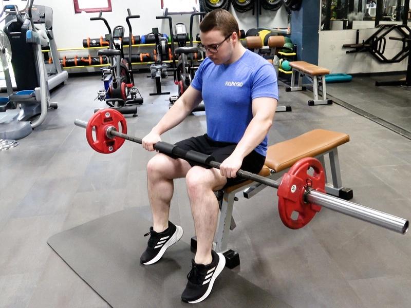 Seated Heel Raises With Barbell, view 2