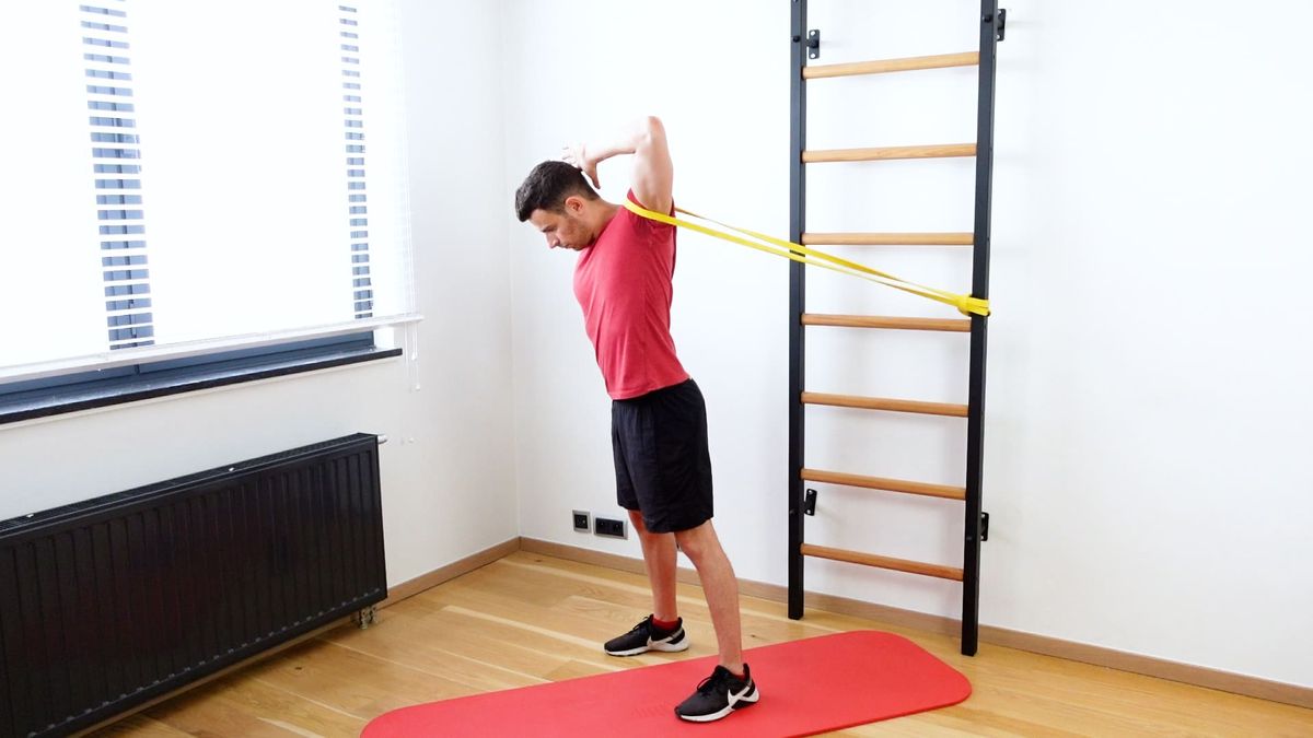 Shoulder Rotation Behind the Head & Back With Elastic Band Rear Traction