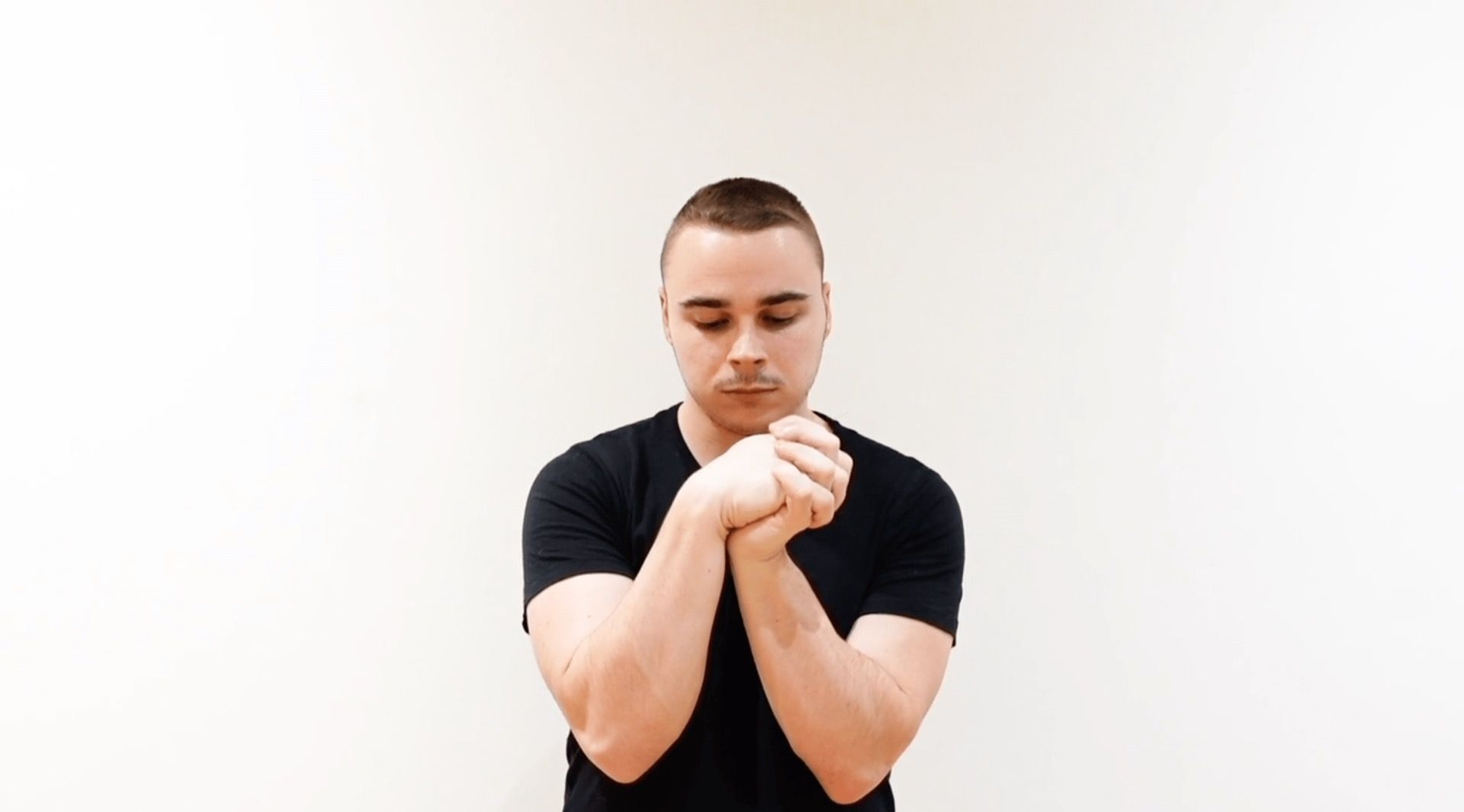 Wrist Flexion / Extension Mobilization With Interlaced Fingers, view 2