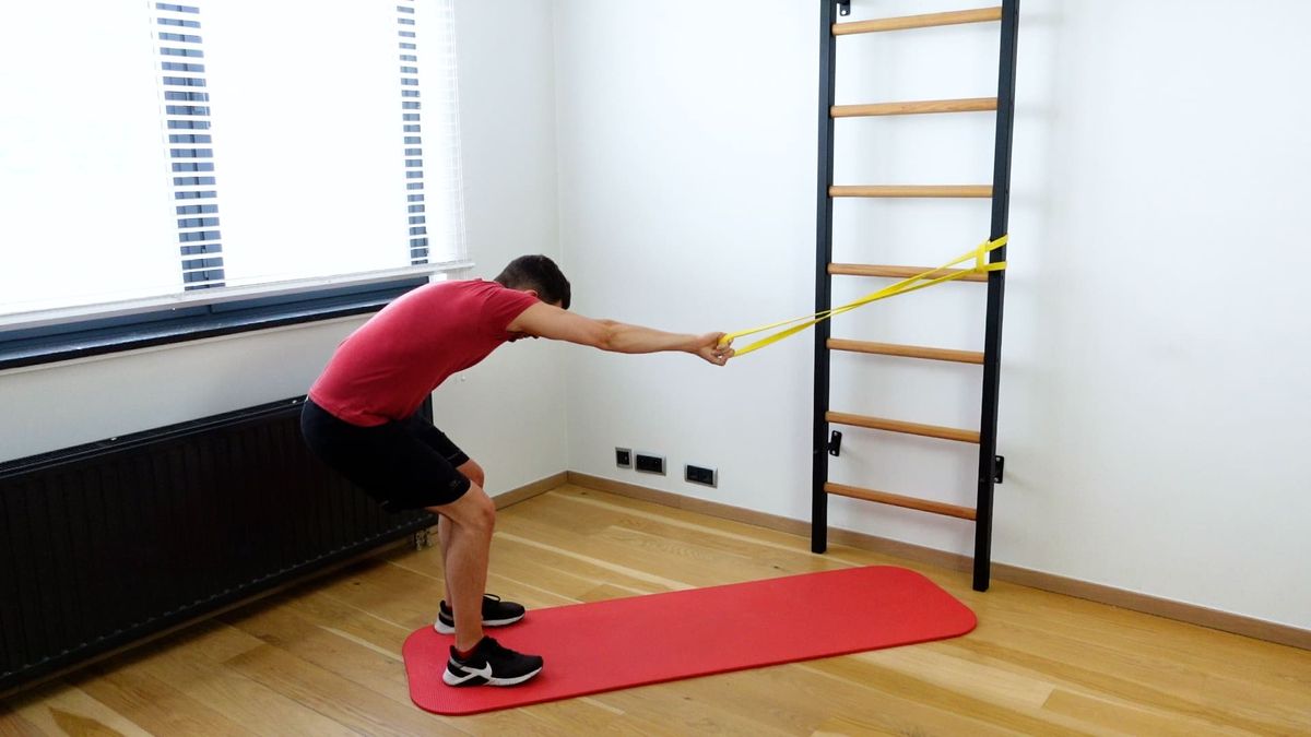 Rotation d'épaule en flexion avec traction de l'élastique