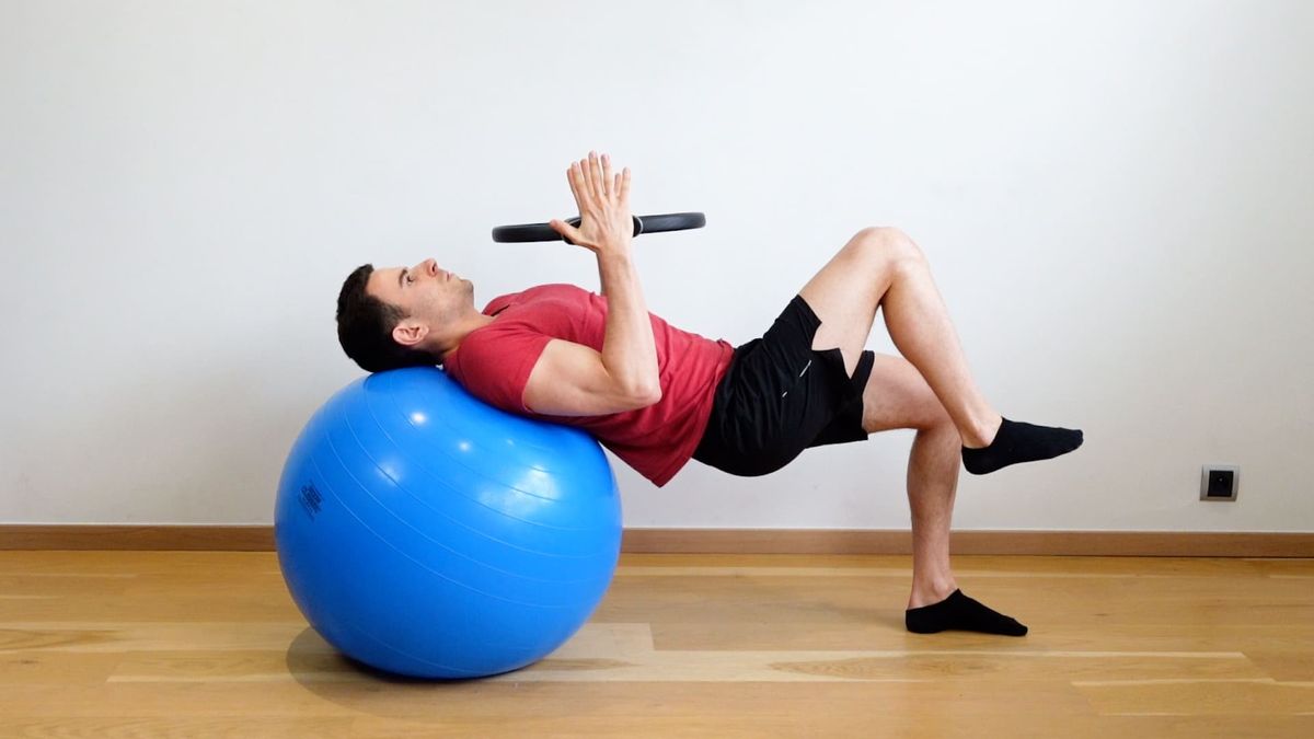Single-Leg Bridge on Swiss Ball With Transverse Abdominis Contraction & Upper Body Lock