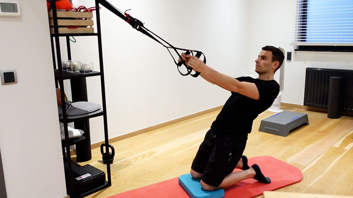 Renforcement excentrique quadriceps avec TRX