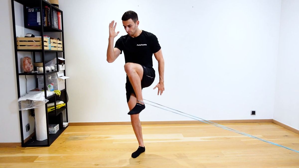 Flexion de hanche avec traction latérale de l'élastique