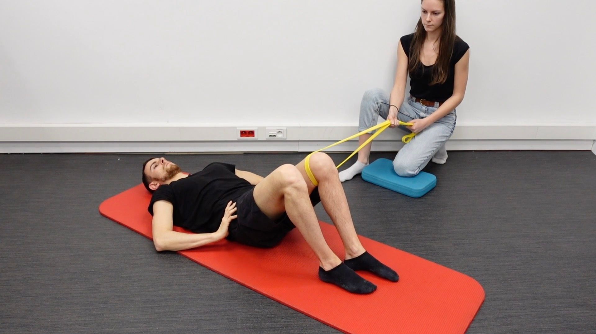 Hip Adduction Strengthening Supine With an Elastic Band, view 2