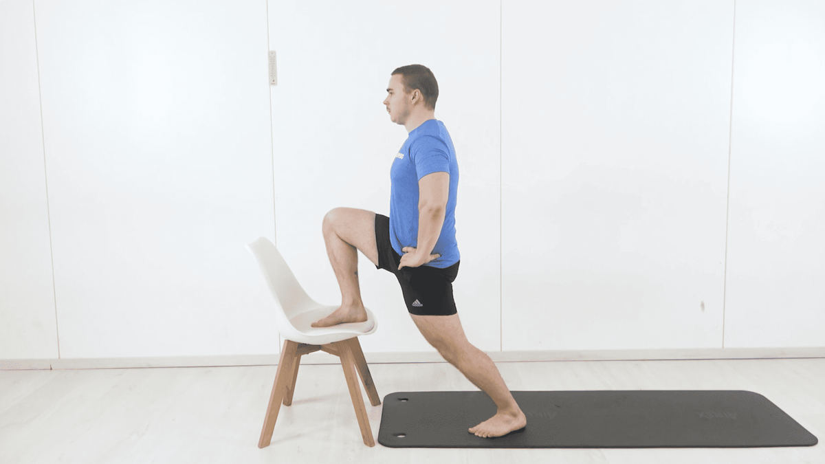 Standing Iliopsoas Stretch With Foot on Chair