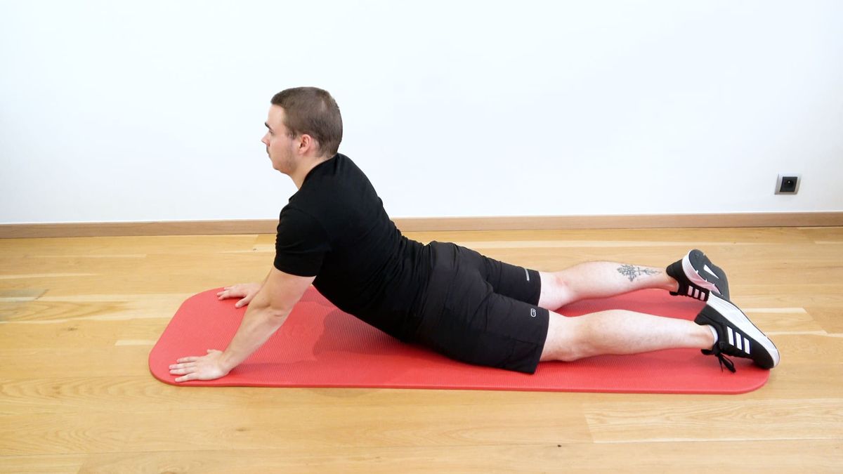 Extension lombaire bras tendus