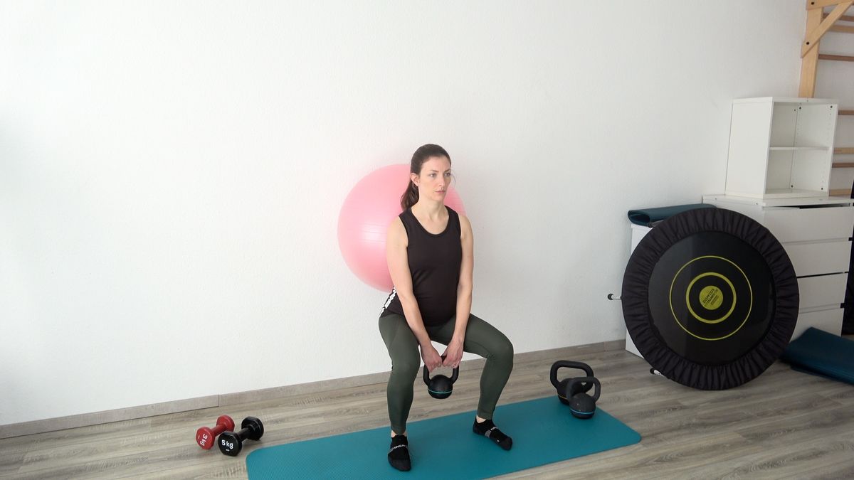 Squat With Weight & Swiss Ball
