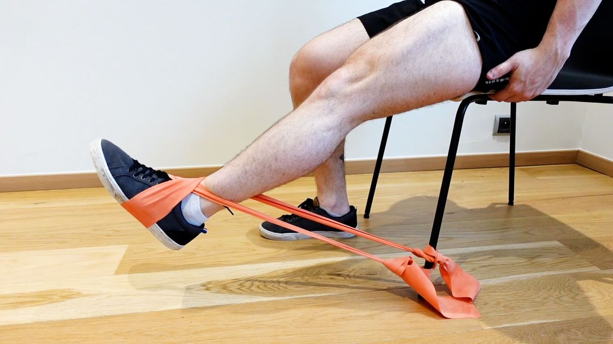 Seated Quadriceps Strengthening With Band Anchored to Chair