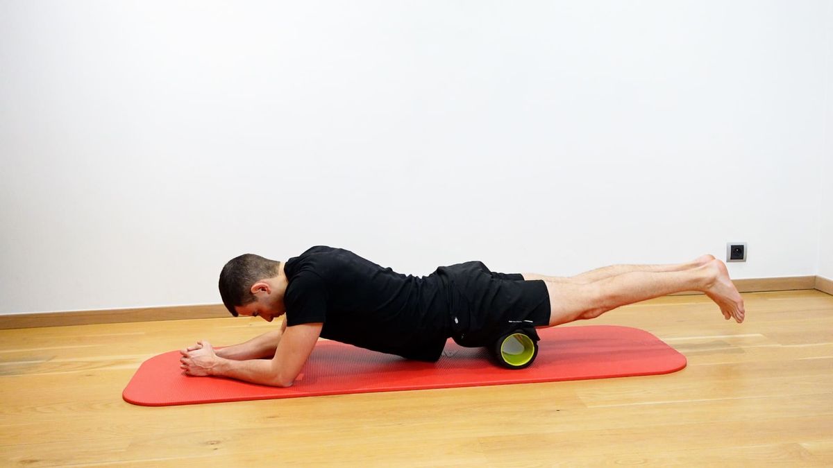 Relâchement points de tension quadriceps avec rondin