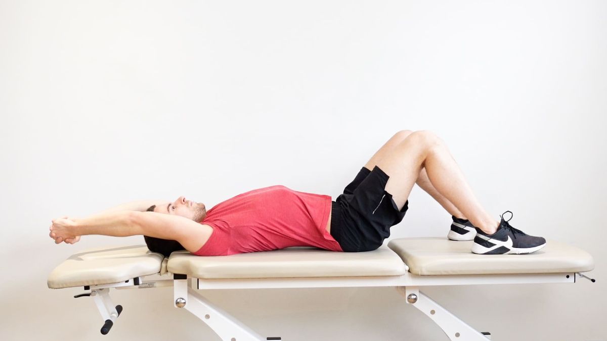 Supine Assisted Shoulder Flexion With Clasped Hands