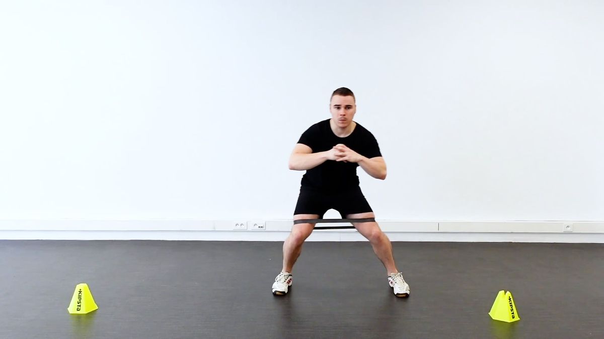Lateral Steps With Elastic Band Around the Knees