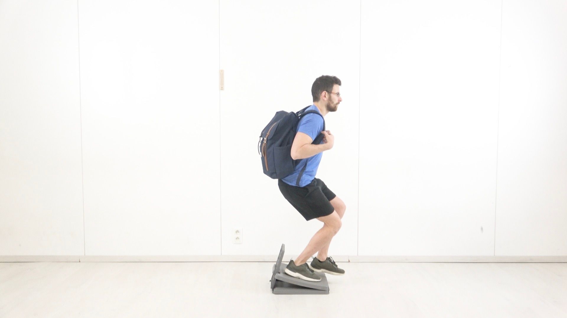 Weighted Eccentric Decline Squat