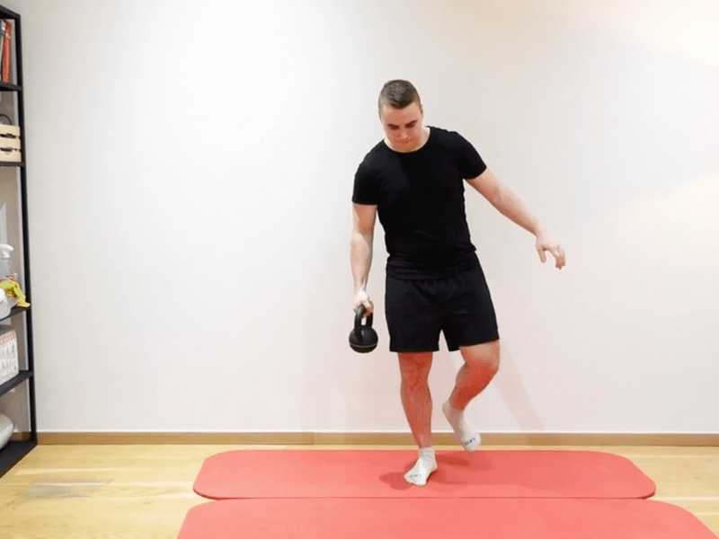 Single-Leg Balance With Kettlebell Transfer, view 2