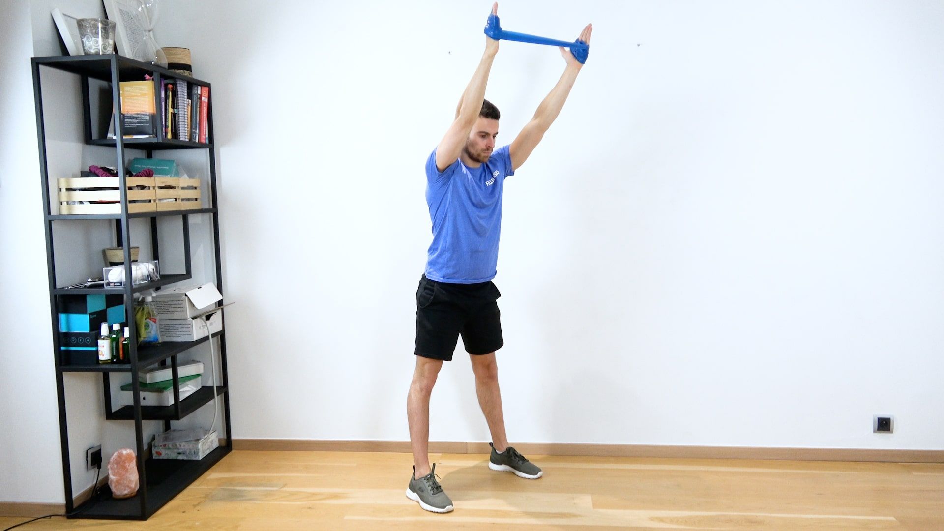 Demi-squat avec élastique, vue 1