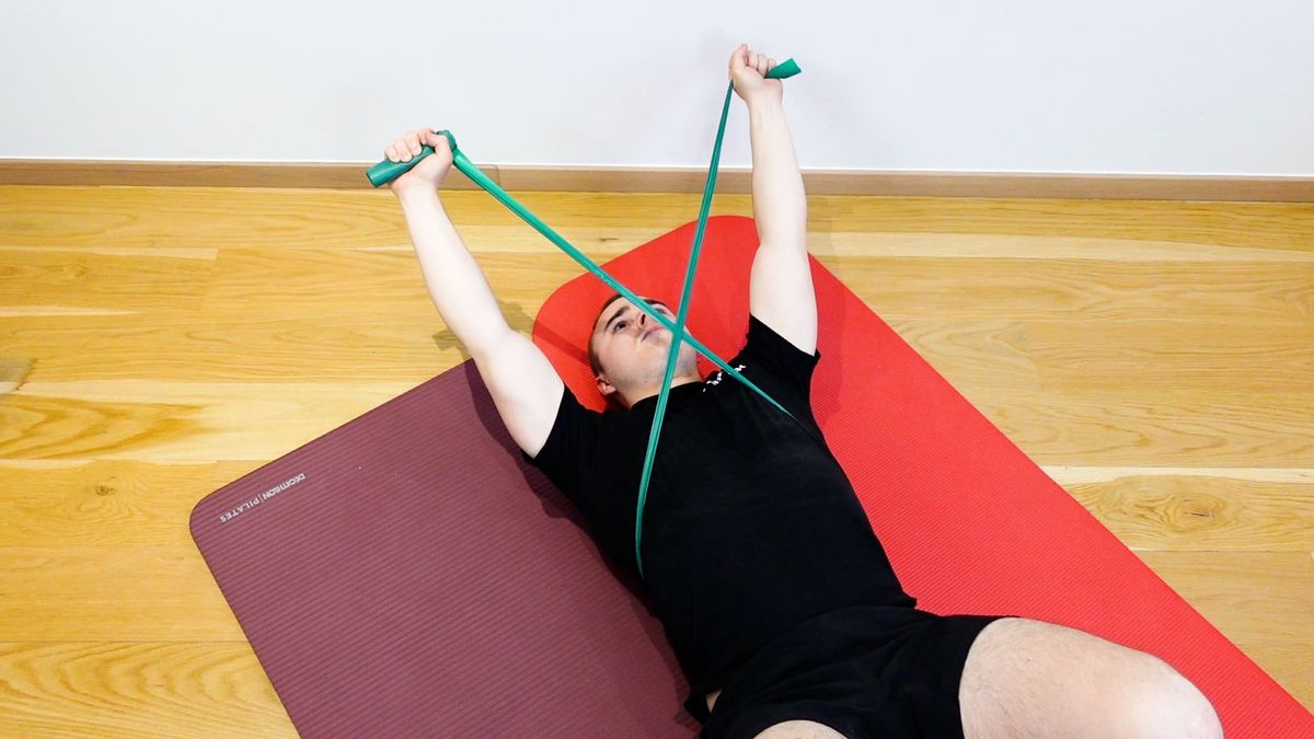 Serratus Anterior Strengthening Supine, Elastic Band Around the Shoulder Blades