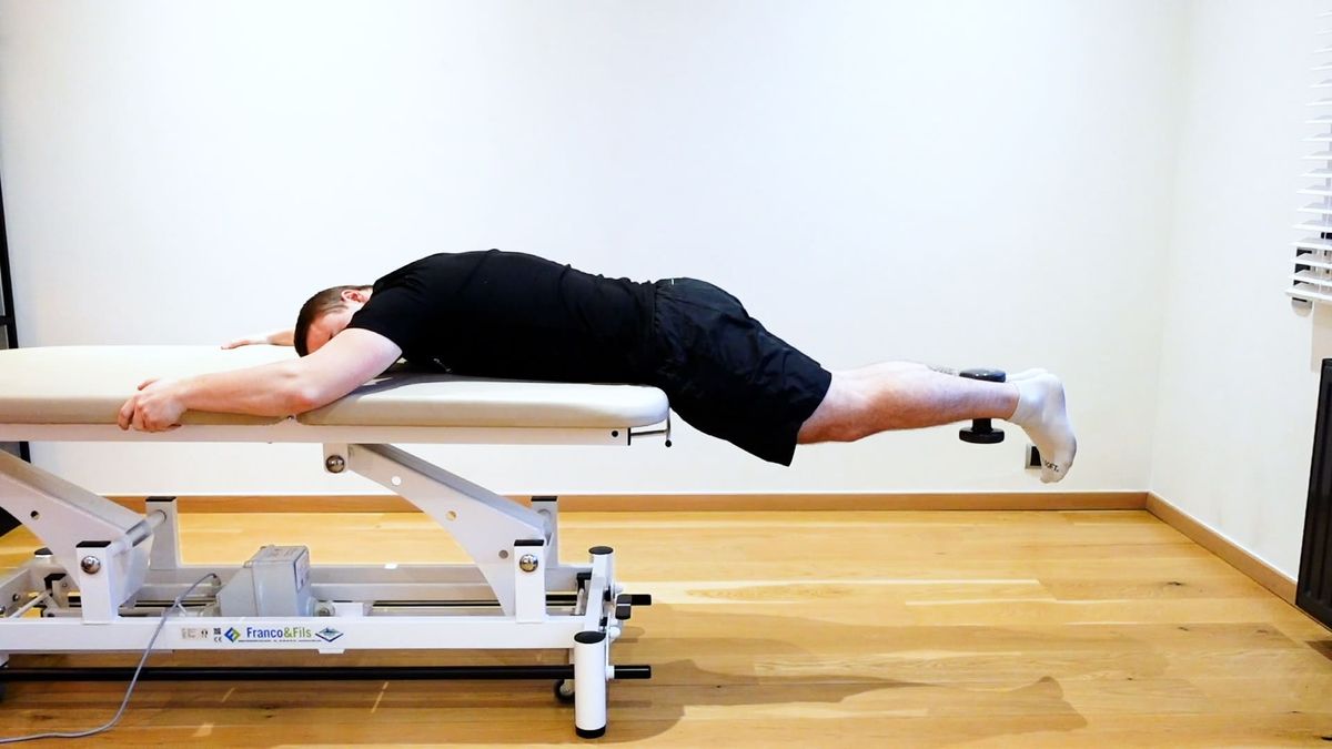 Lower Back Extension Strengthening With Weight
