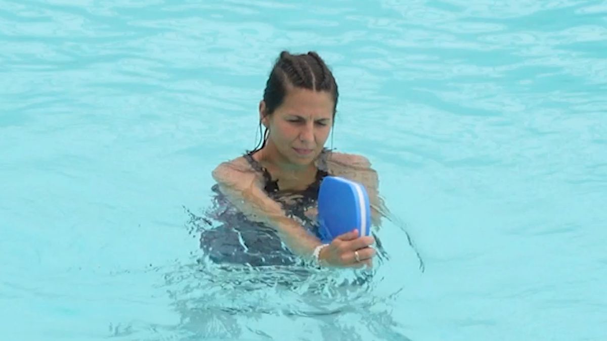 Trunk Rotations With a Kickboard
