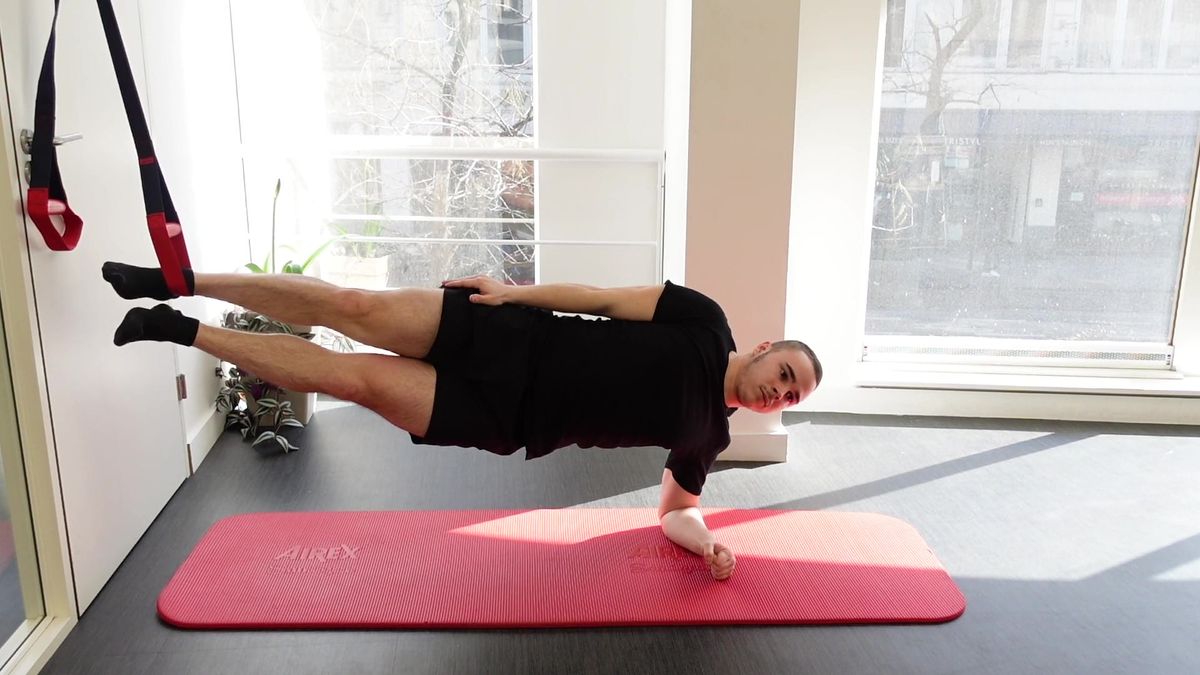 Copenhagen Plank Variation on TRX