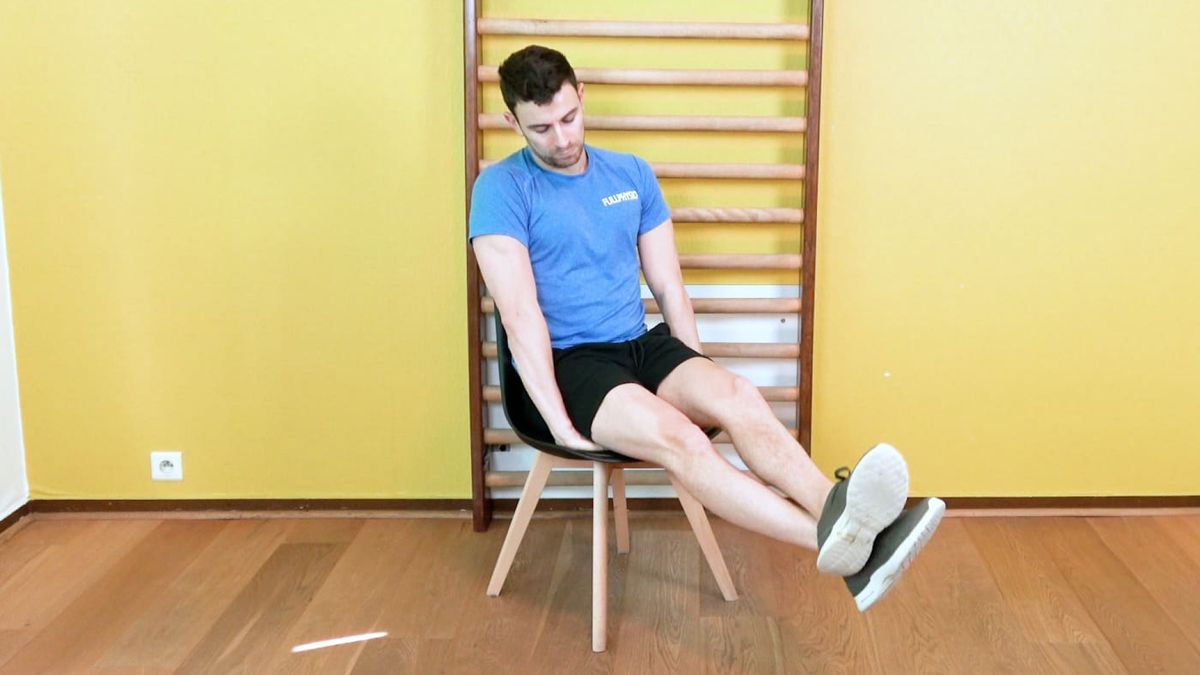 Renforcement excentrique du quadriceps assis, résistance par l'autre jambe