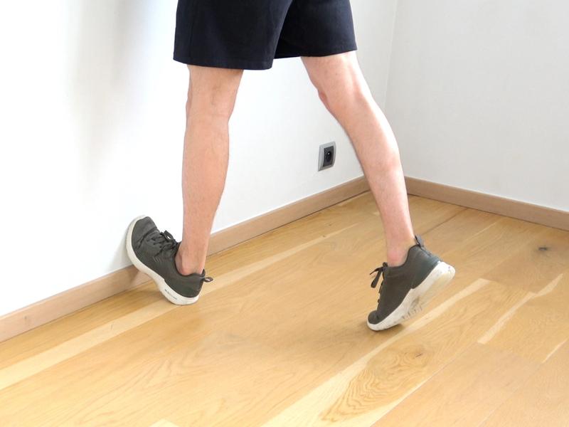 Calf Stretch With Toes Against Wall, view 2