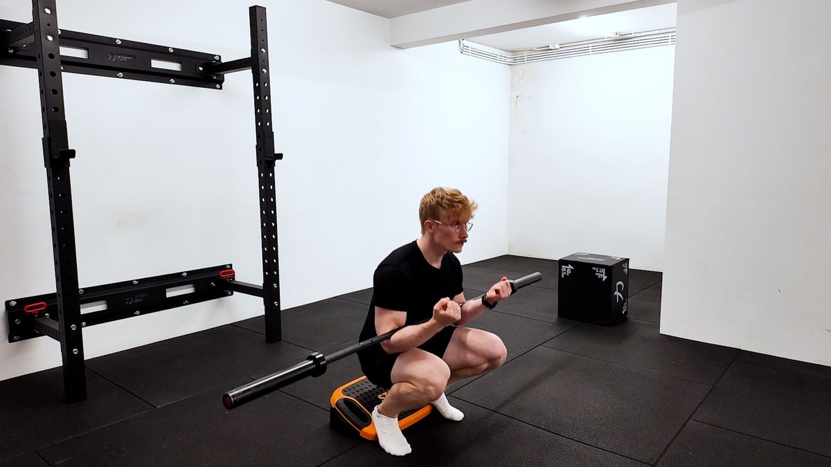 Zercher squat avec talons surélevés