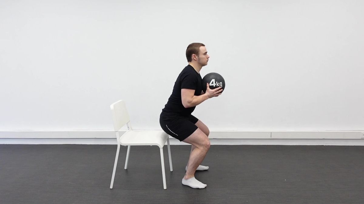 Squat aidé avec charge