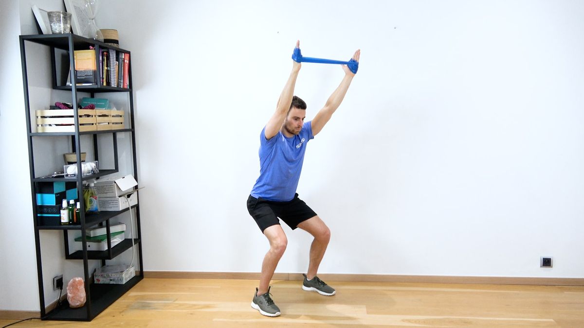 Demi-squat avec élastique