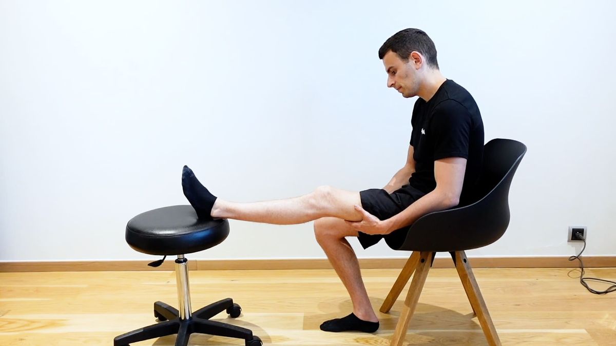 Seated Knee Extension Hold With Heel on Chair