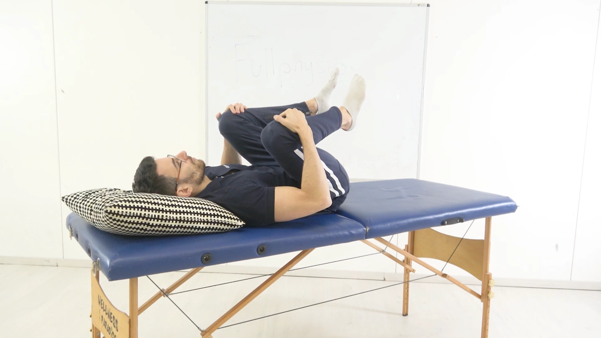 Lumbar Flexion With Knees Apart