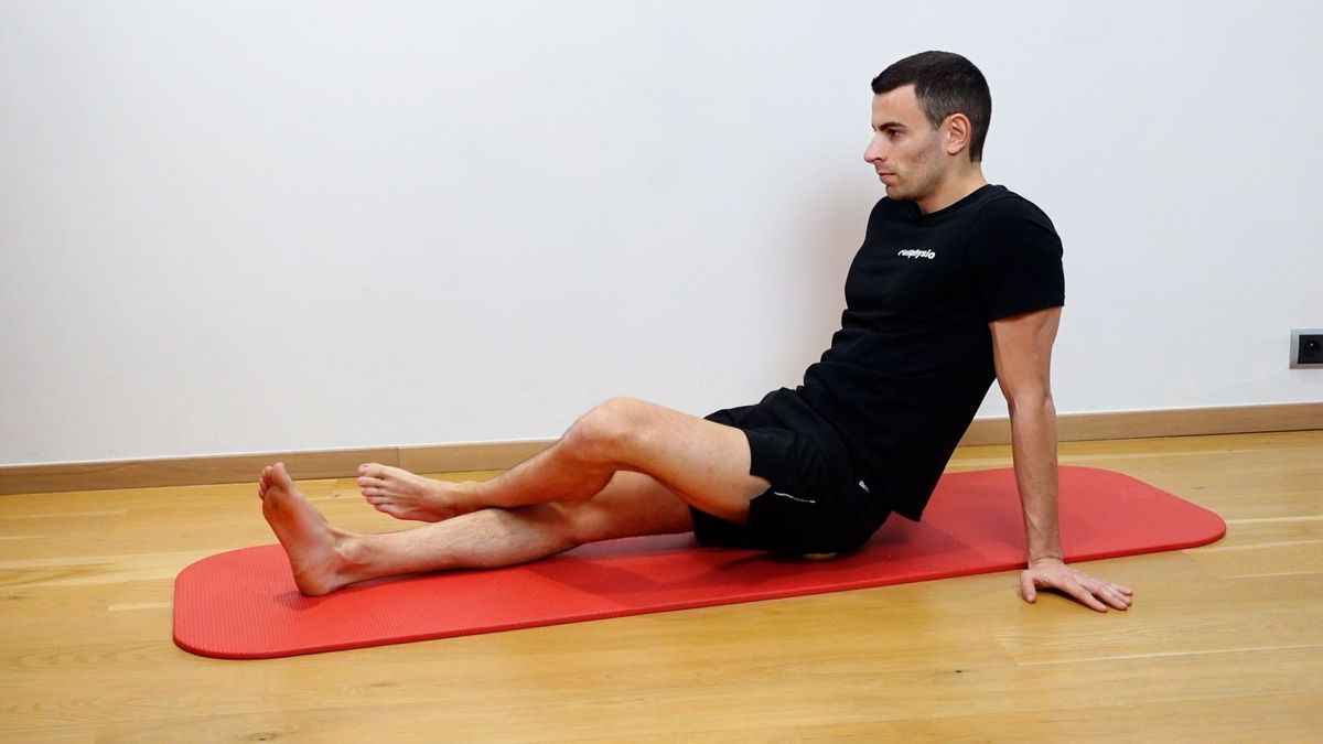 Glute Tension Point Release With Ball & Hip Internal Rotation Along the Leg