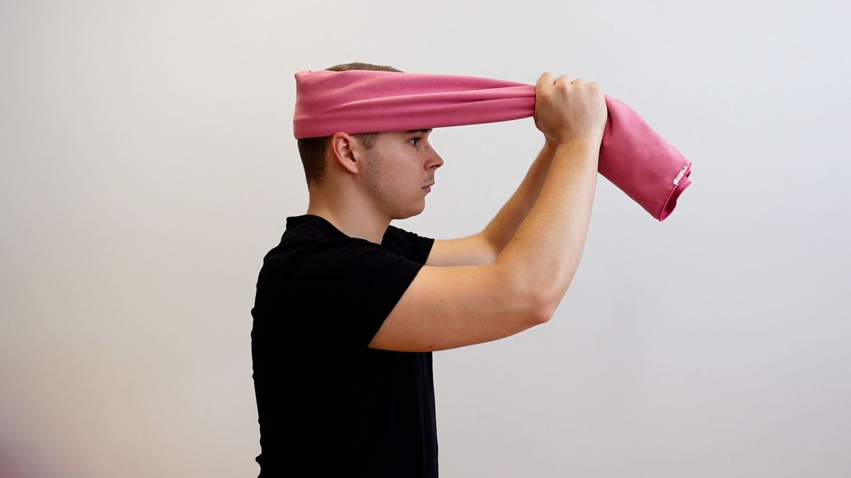 Active-Assisted Cervical Flexion Mobilization With a Towel