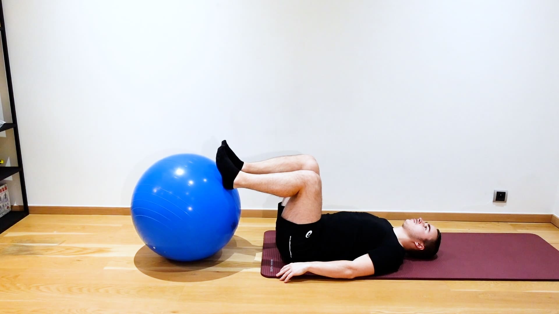 Lumbar Flexion With Swiss Ball, view 2