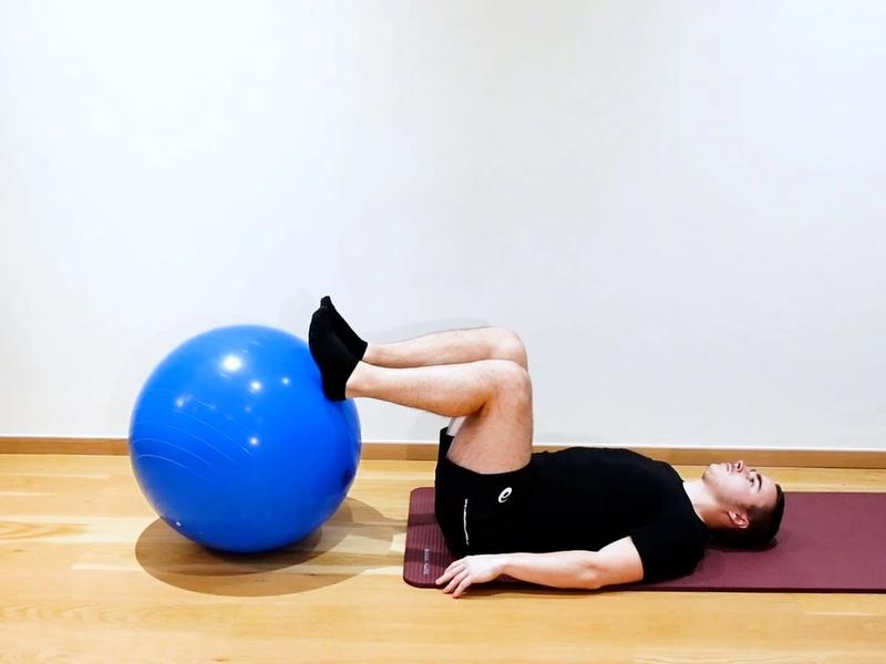 Lumbar Flexion With Swiss Ball, view 2