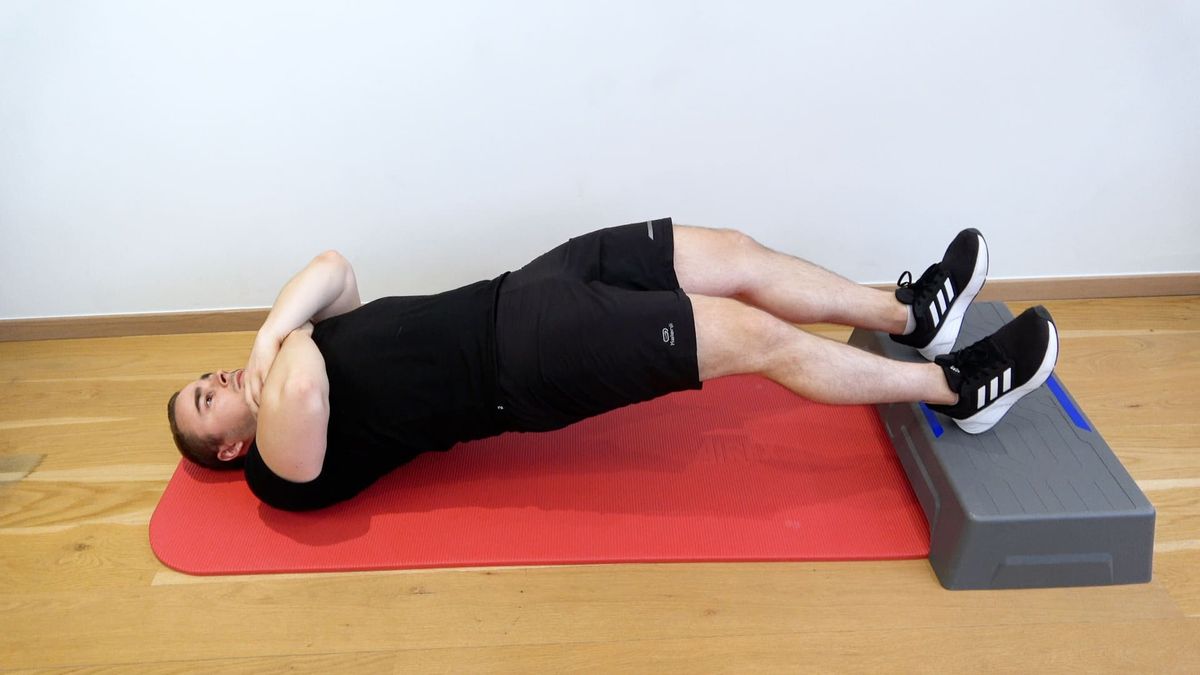 Glute Bridge With Semi-Bent Legs on a Step
