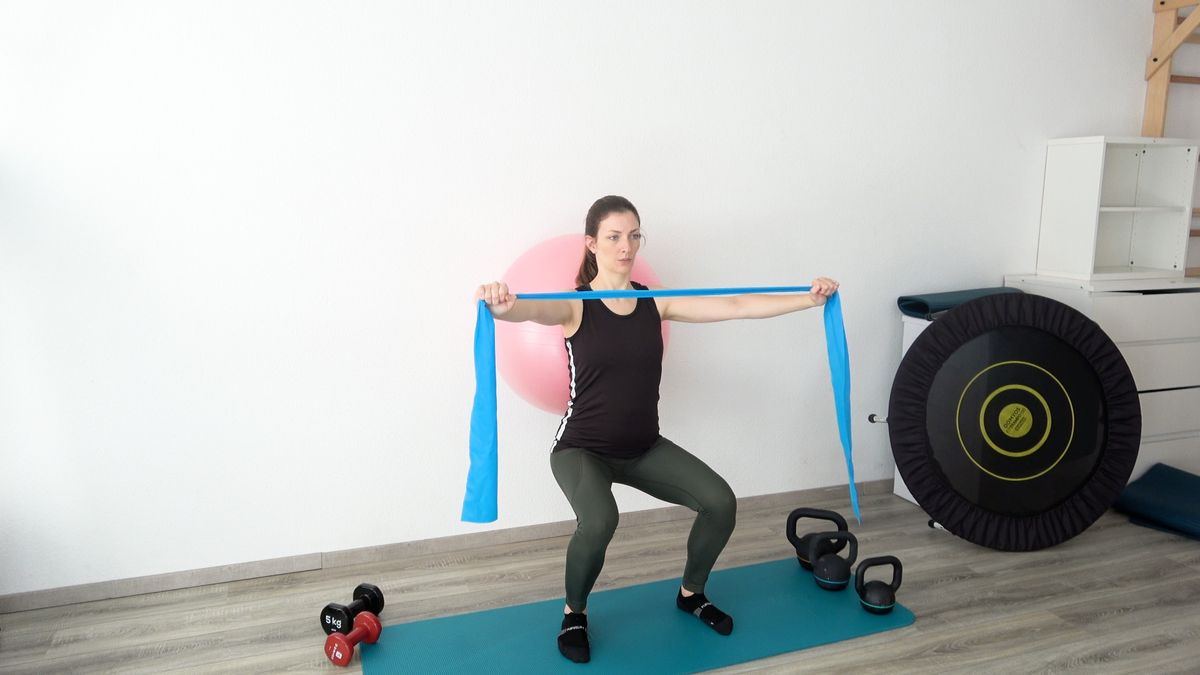 90° Squat With Swiss Ball & Resistance Band