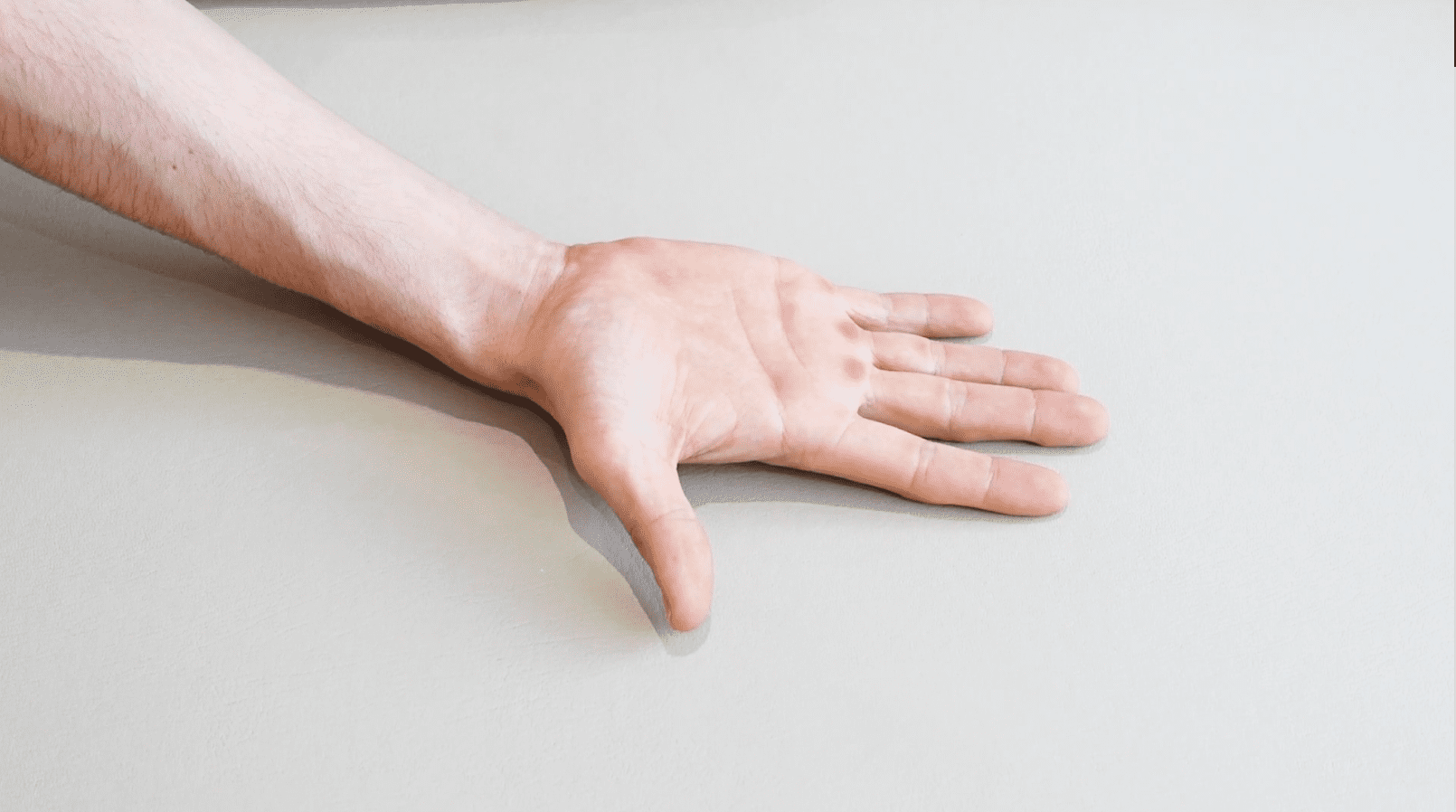 Finger Rolling / Unrolling Mobilization, view 1